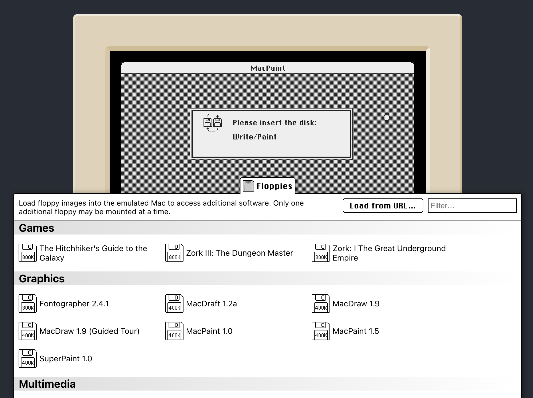 Infinite Mac emulating System 1.0 on the Mac 128k, showng the message 'Please insert the disk Write/Paint' with the floppy drawer open.